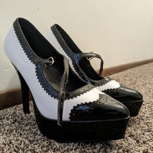 Devious Pleaser wingtip B&W 6" Pump Size 7